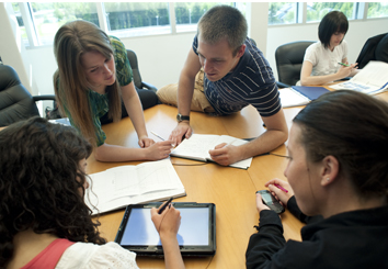 A group of students completing a project in one of our spacious classrooms